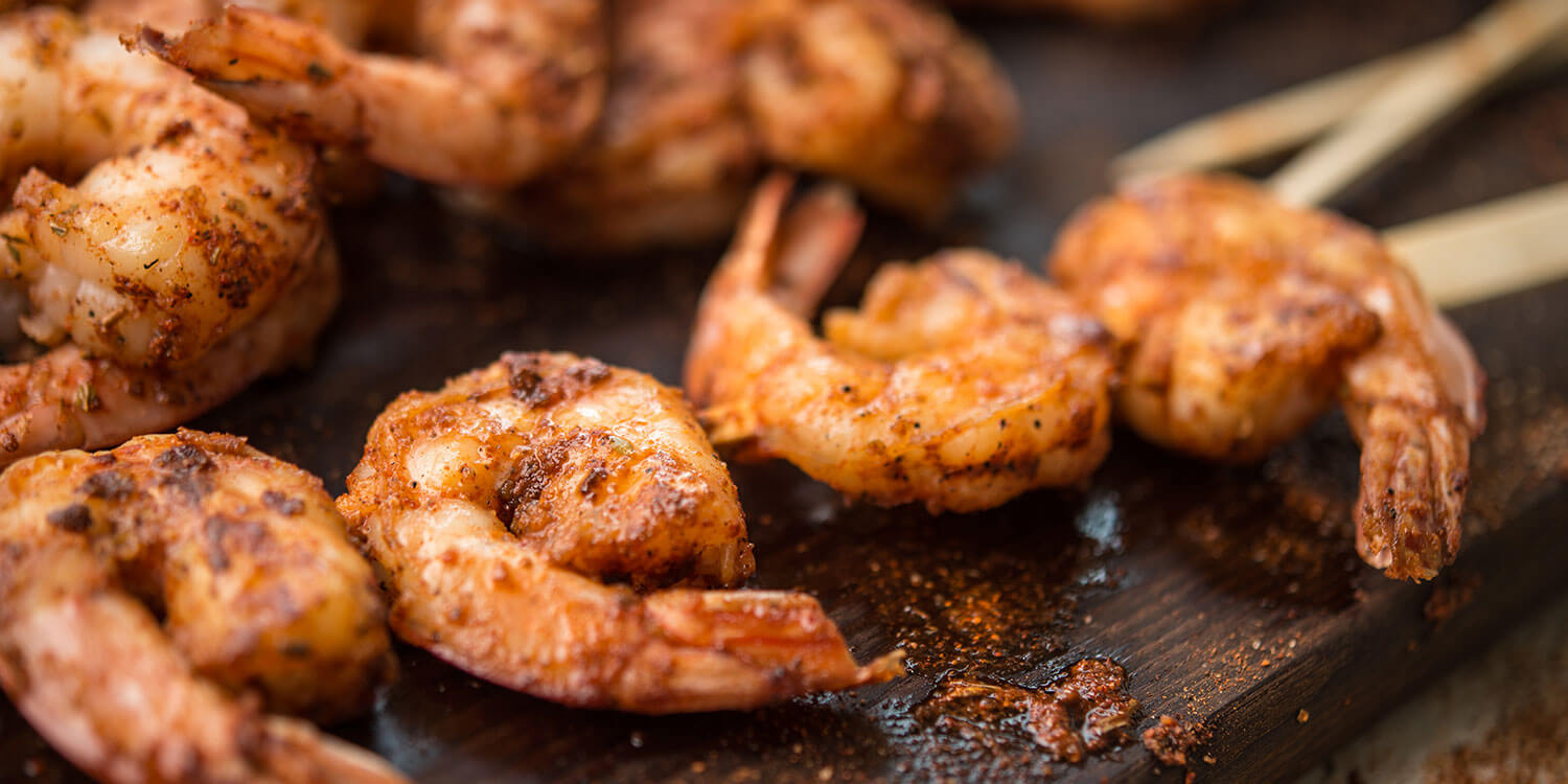 Prawn skewers with different homemade dips